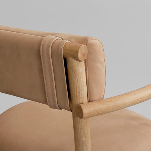 101 Copenhagen Nama Dining chair in nubuck leather close up of back strap