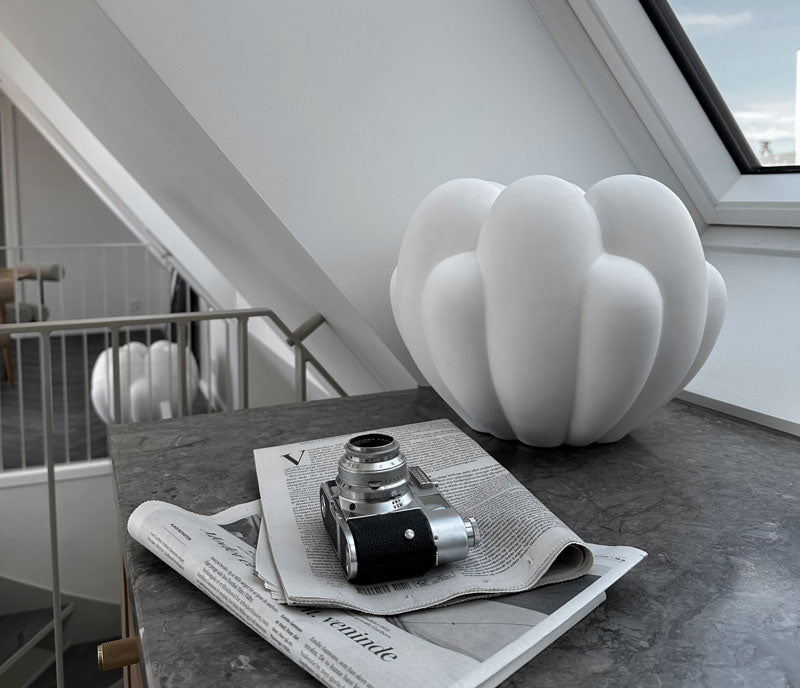 Bloom vase in a window