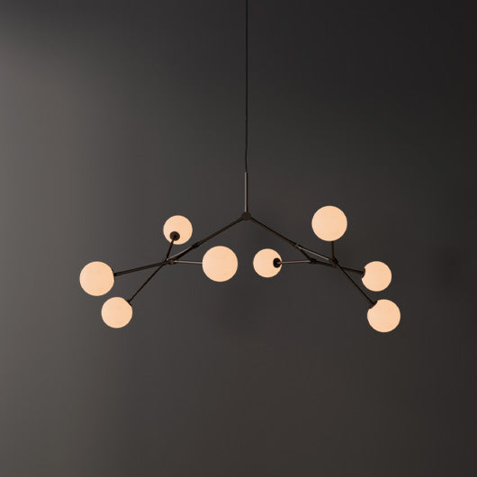 A modern branch-shaped Drop chandelier Bulp lamp with multiple spherical frosted glass shades on a dark gray background.