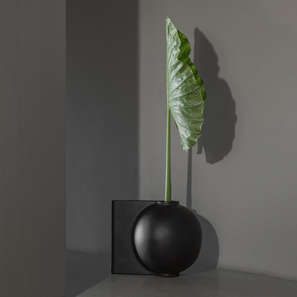 101 Copenhagen Offset vase with exotic botanical arrangement by Bosque
