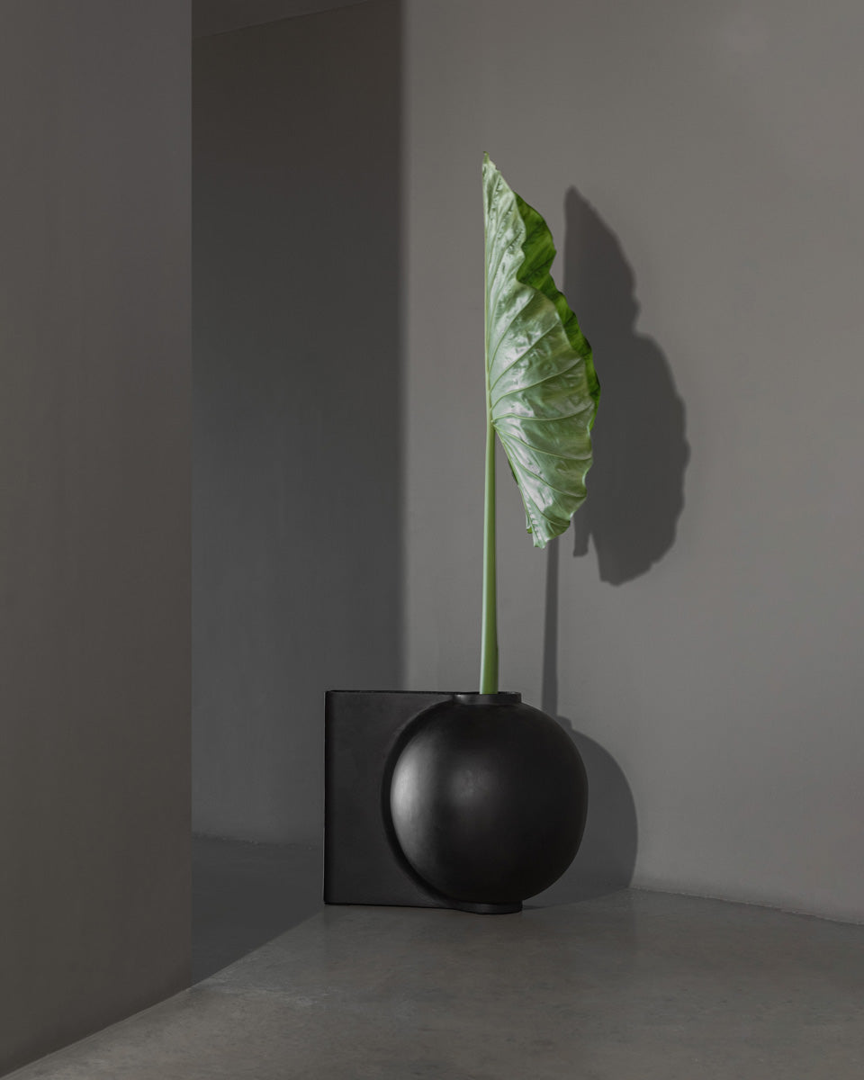101 Copenhagen Offset vase with exotic botanical arrangement by Bosque