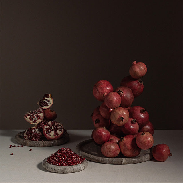 Bosque arrangement of pomegranate on Enkei Trays