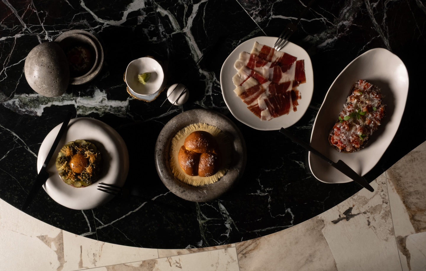 101 Copenhagen and Fume dinnerware collaboration using plates, trays, Jars and cutlery