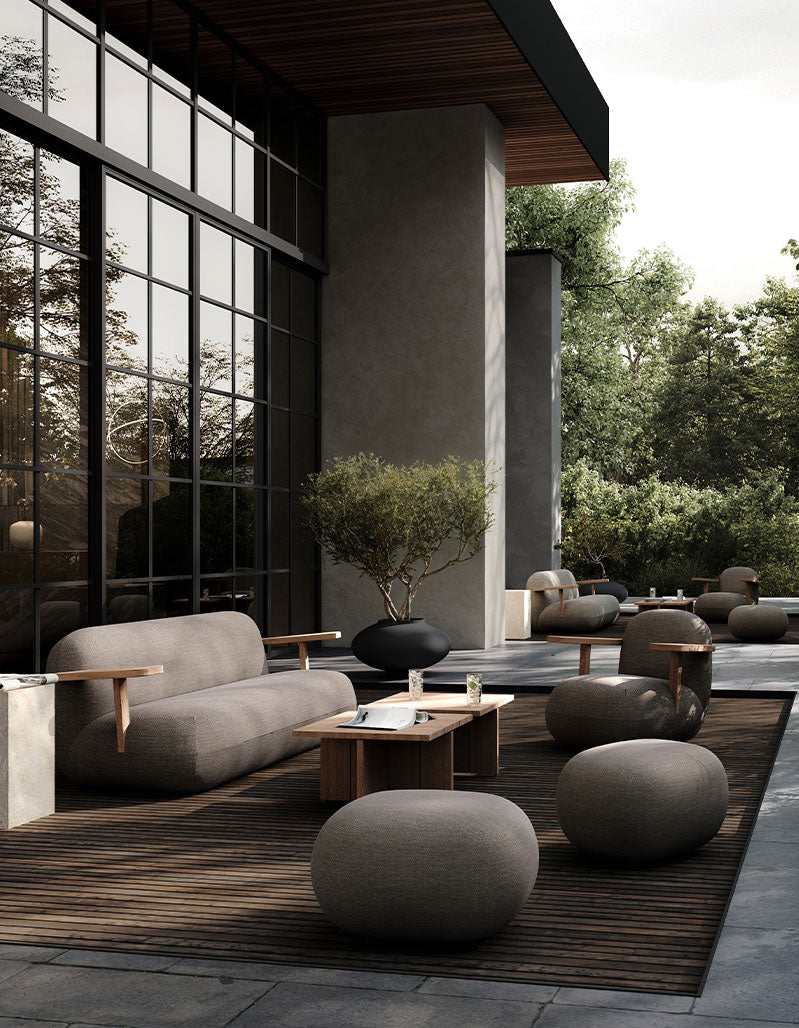 Modern outdoor lounge collection in stone gray.