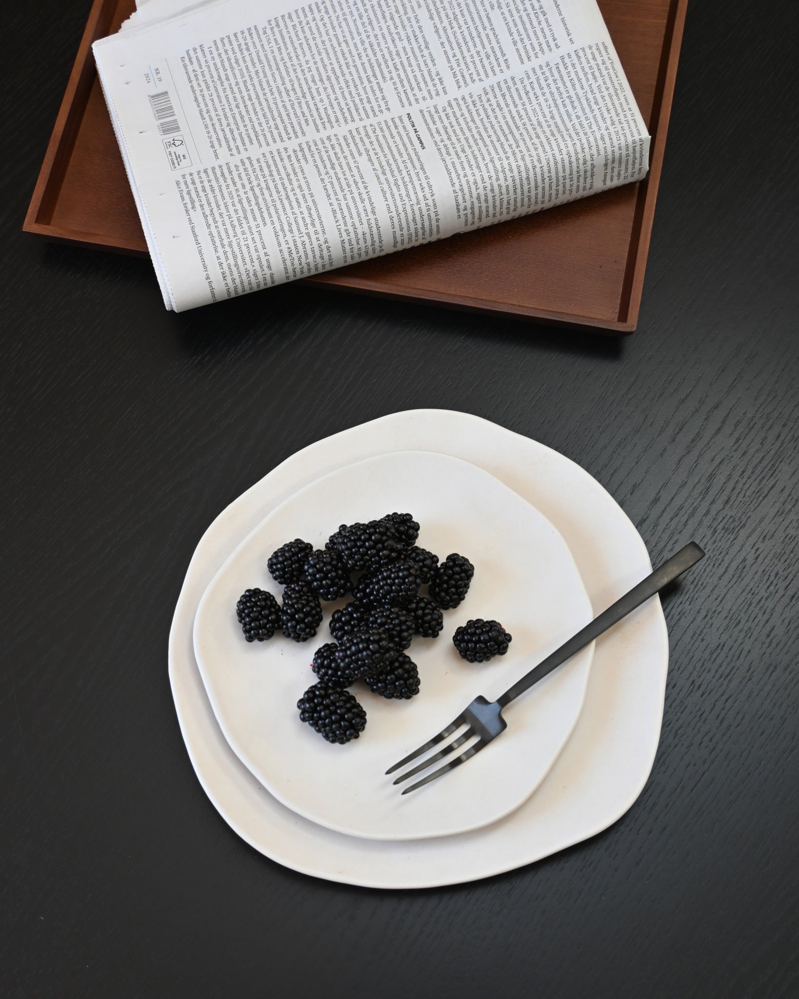 101 Copenhagen Native plates with berries and black Kogei fork