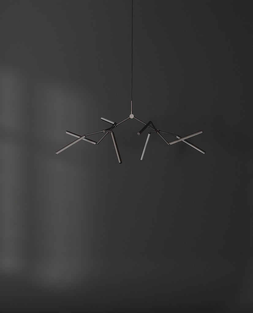 101 Copenhagen Stick chandelier Mini Bronze turned on and off