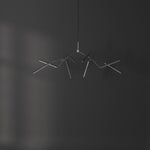 101 Copenhagen Stick Chandelier Mini Chrome turned on and off