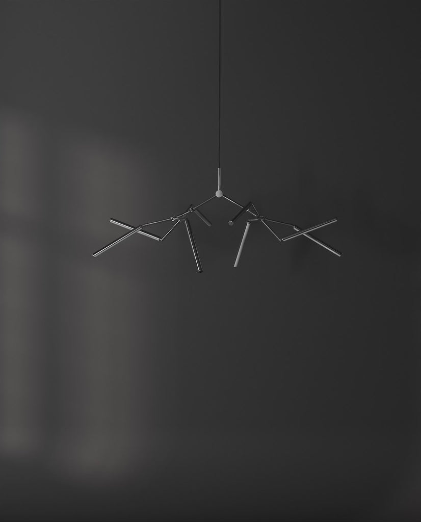 101 Copenhagen Stick Chandelier Mini Chrome turned on and off