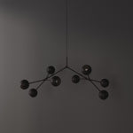 101 Copenhagen Drop Globe chandelier - Burned Black turned on and off