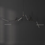 101 Copenhagen Stick chandelier Bronze turned on and off
