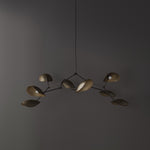 101 Copenhagen Stingray Chandelier Brass turned on and off